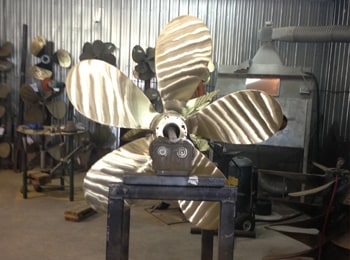 Large polished boat propeller